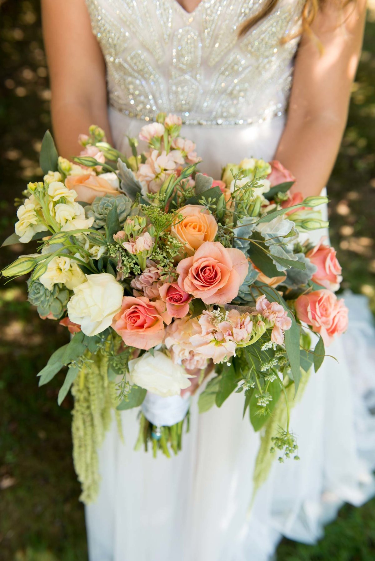 Bride's dress and bouquet at Flowerfield