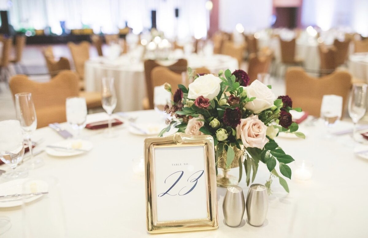 Elegant wedding white, burgandy, and caramel tablescape
