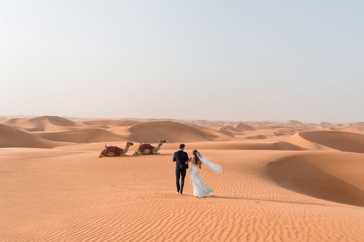 Desert Elopement photoshoot amidst endless dunes in Dubai at the Arabian Nights Village organized by Lovely & Planned