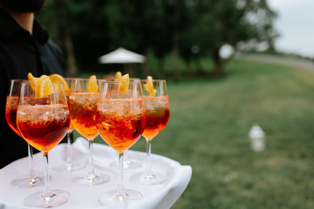 Passed Aperol Sprtiz Cocktails at an outdoor wedding in the Hudson Valley