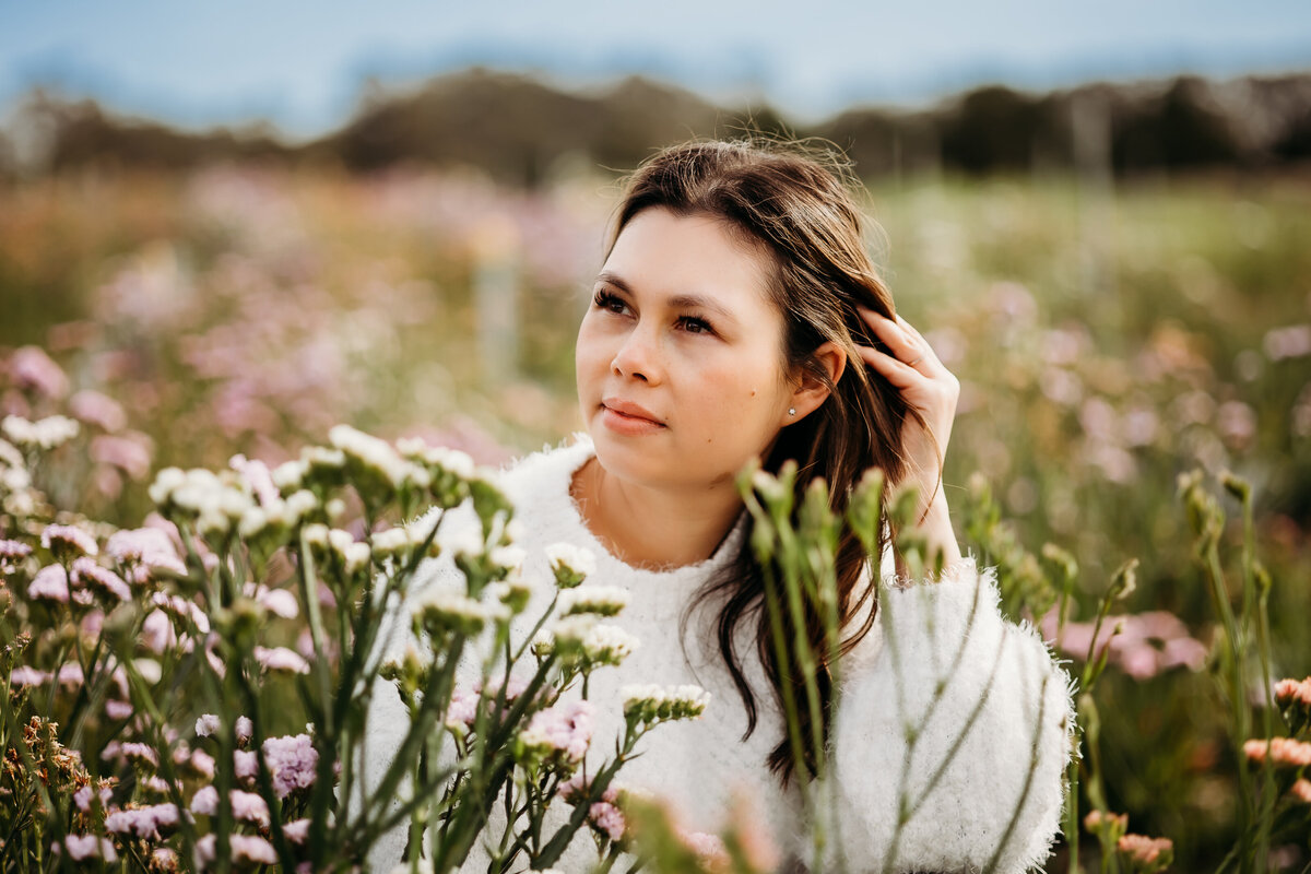 Story Lens Photography posing in flower field