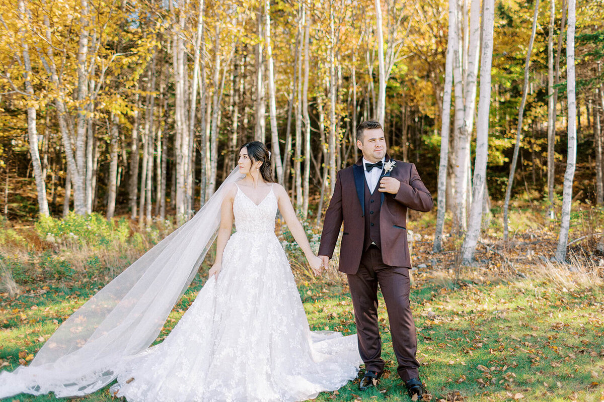 bride-and-groom-infront-of-yellow-trees