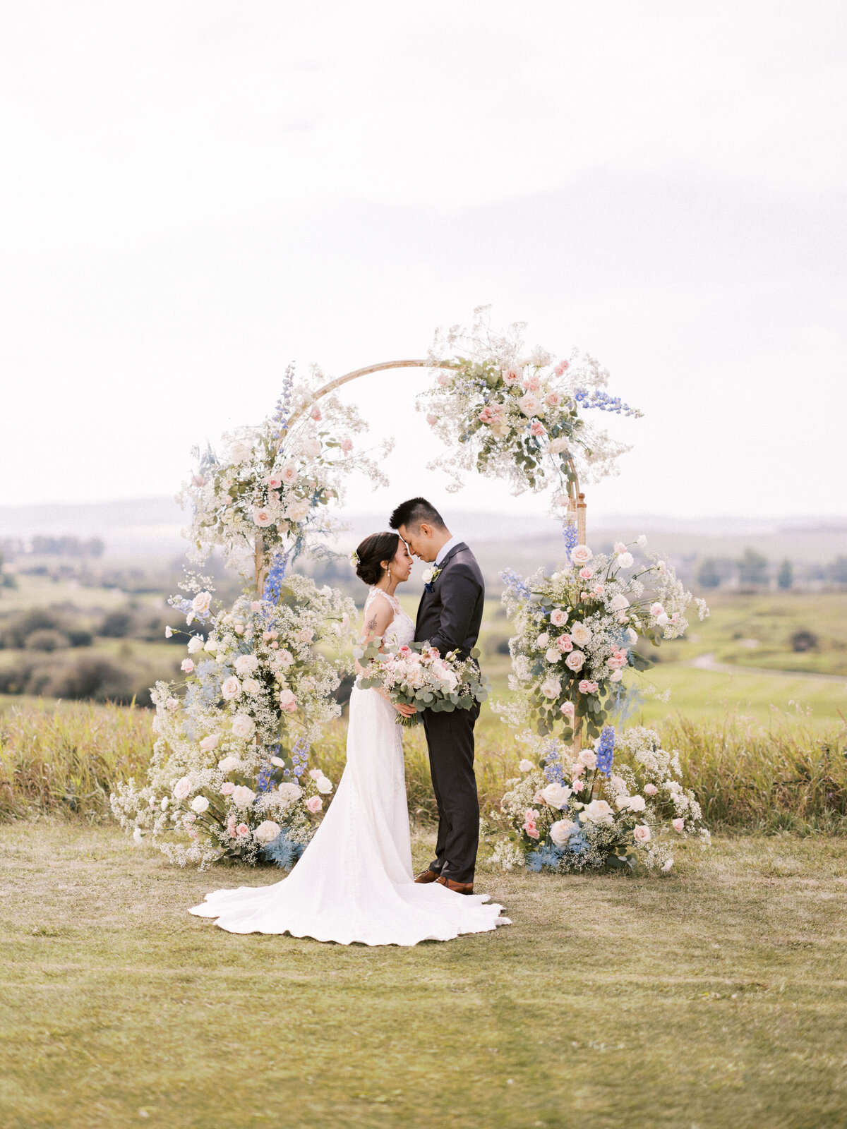 calgary-wedding-ceremony-floral-arch-dreamy-cloud-flowers