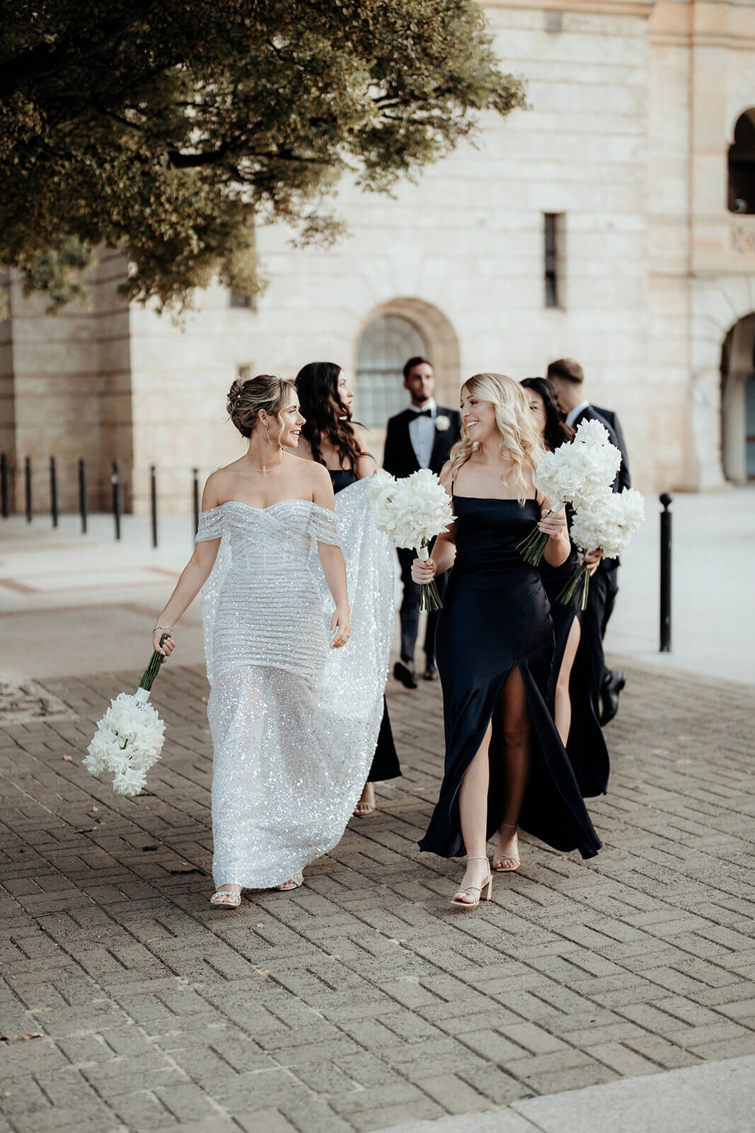 Bride walking with the bridal party