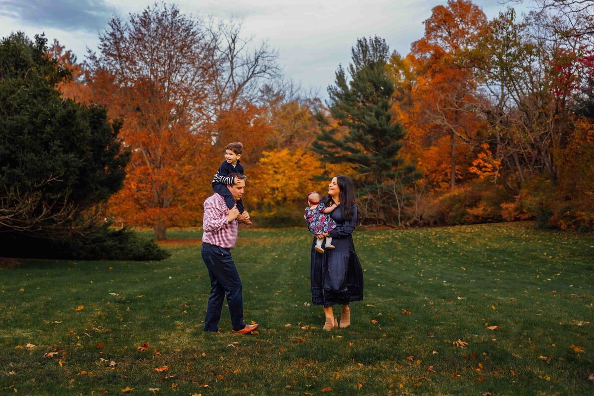 family in park with foliage long island photography