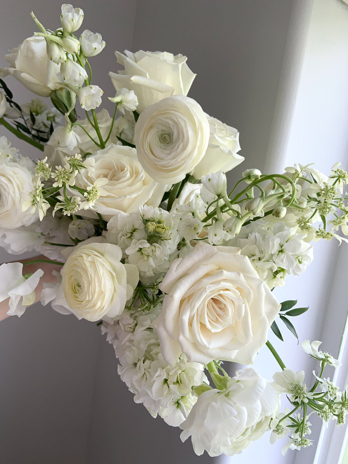 Classic, timeless wedding flowers white bouquet.