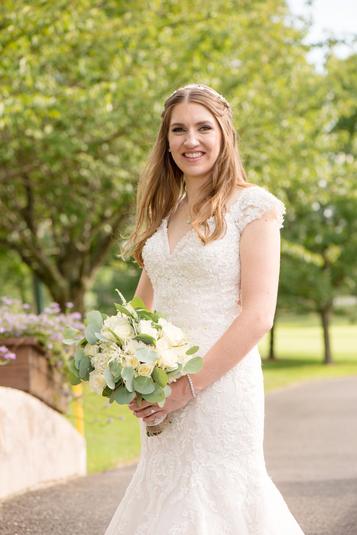bride solo shot outside Willow Creek Golf and Country Club