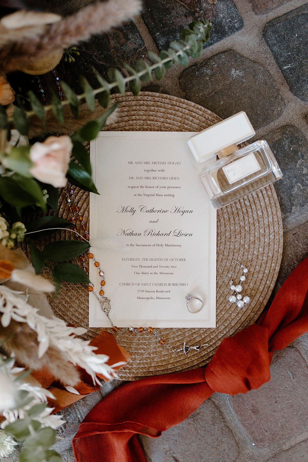 a flat lay of a wedding invitation