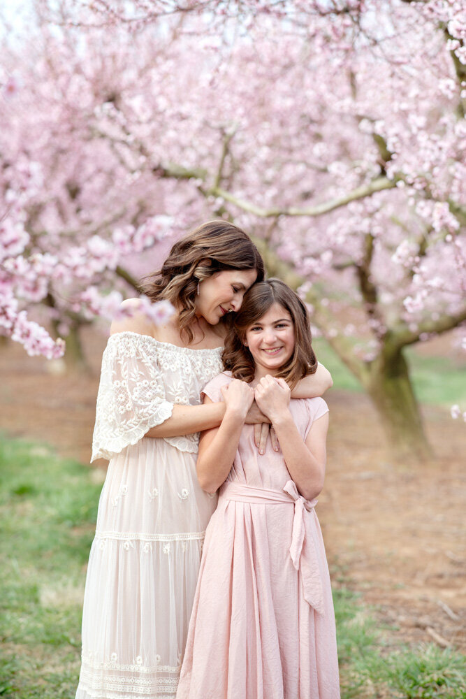 Family session of mother and daughter wearing dresses