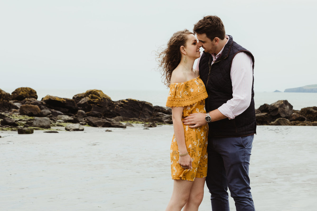 kissing engagement photograph at poppit beach