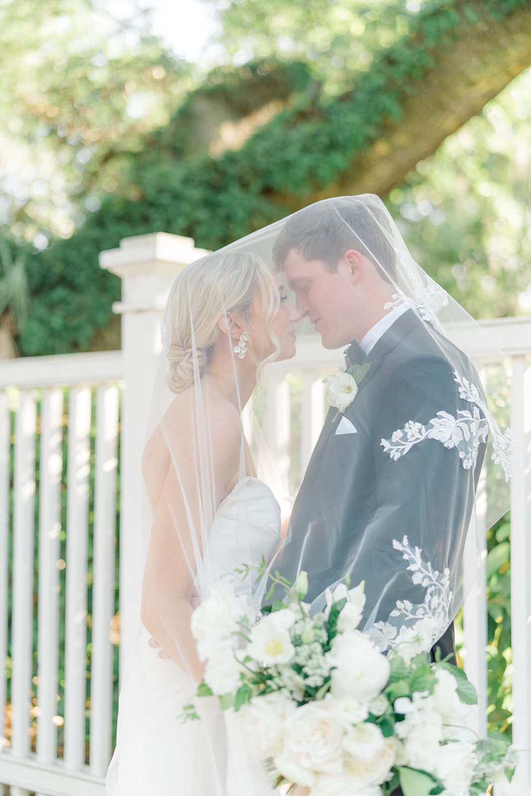 Bride and groom under the veil. Wedding day portraits at Thomas Bennett House. blonde bride. Kailee DiMeglio Photography.