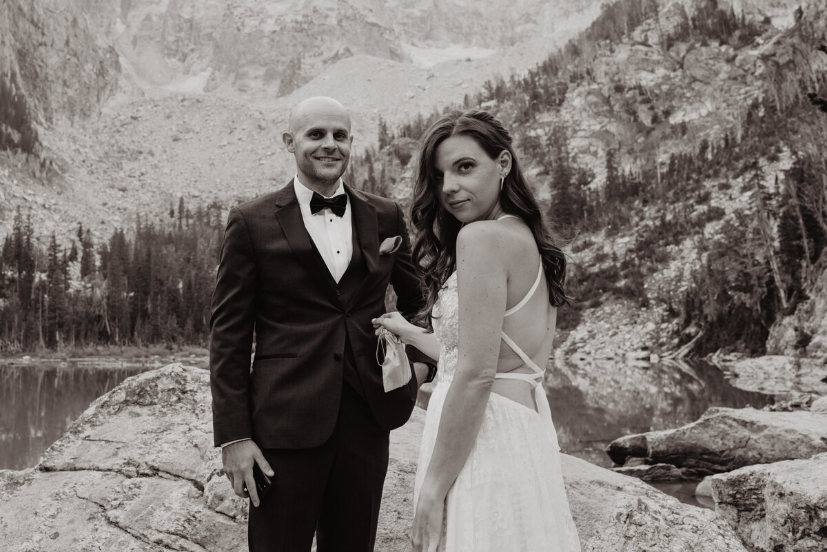 Jackson Hole photographers capture couple smiling before elopement ceremony