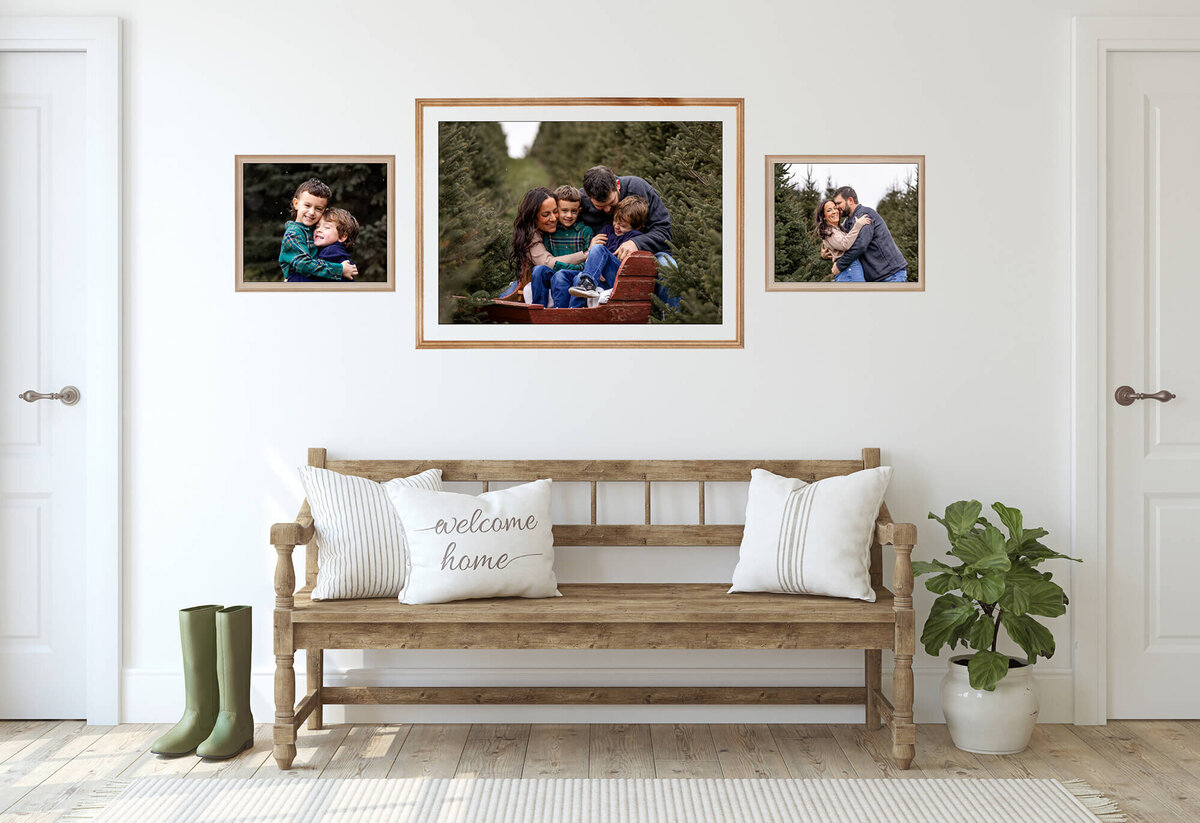 Farmhouse entryway displaying family pictures on the wall.