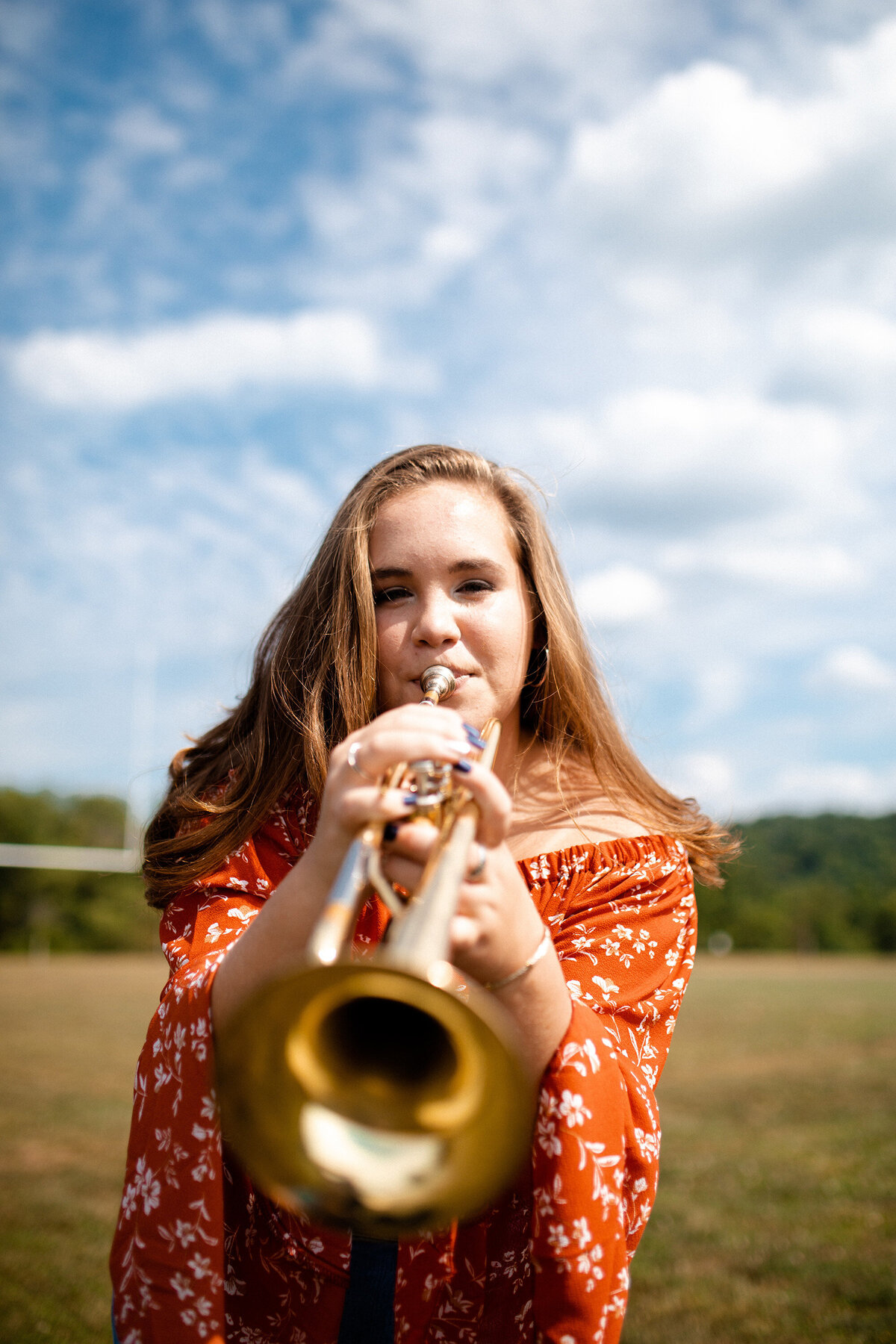 graduating-highschool-girl-with-trumpet