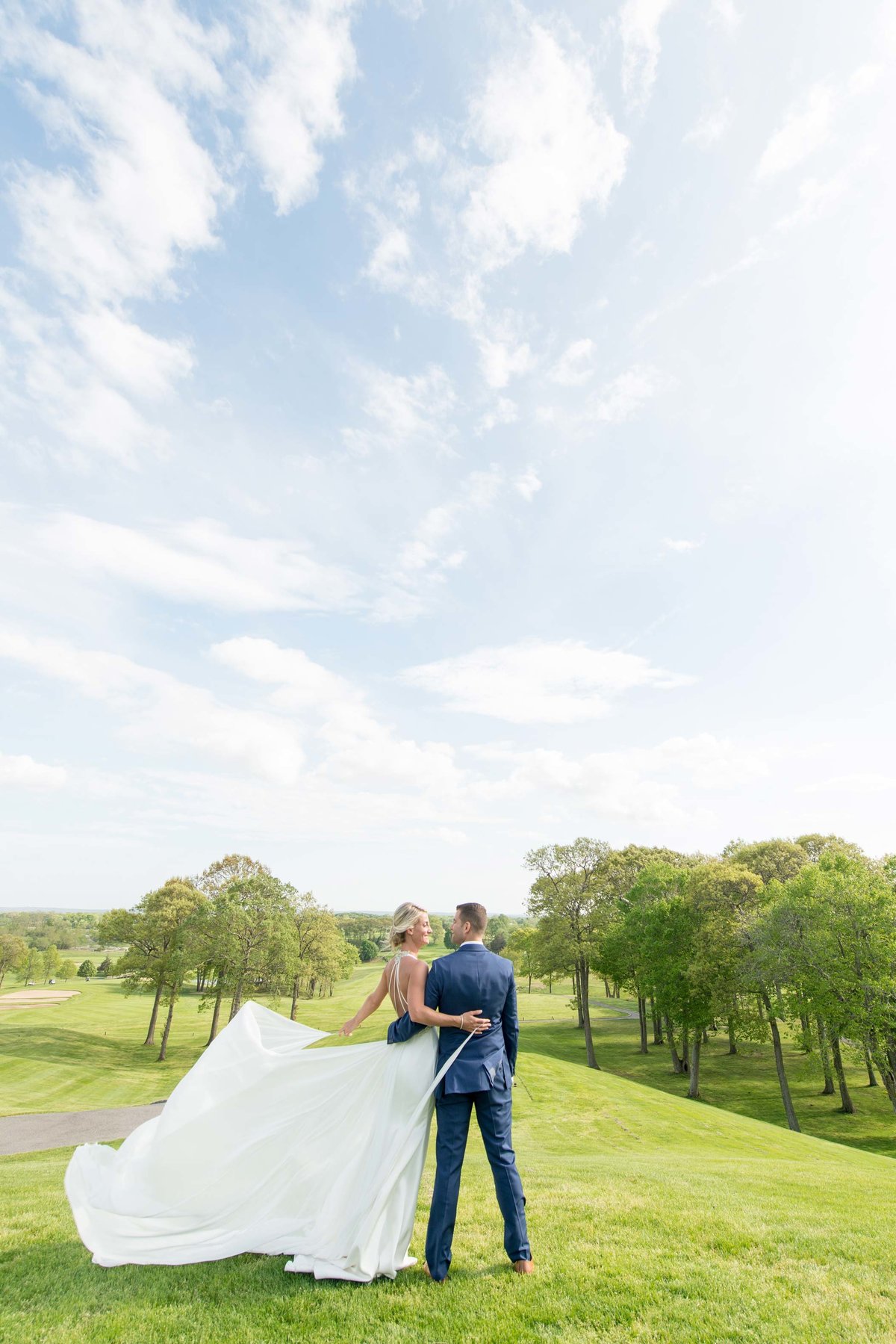 Golf view with bride and groom at Giorgio's Baiting Hollow