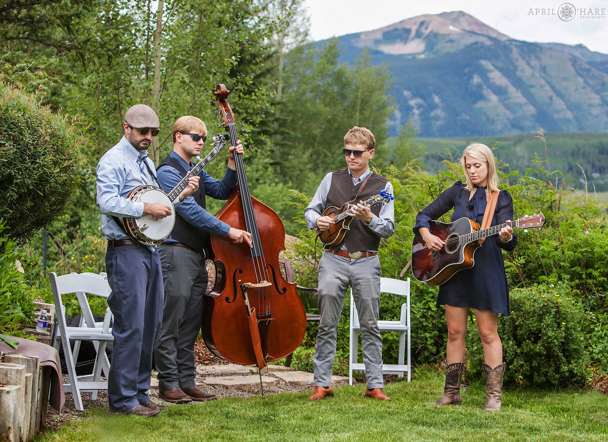 Bluegrass country band plays at outdoor Crested Butte Wedding ceremony at Mountain Wedding Garden in Colorado