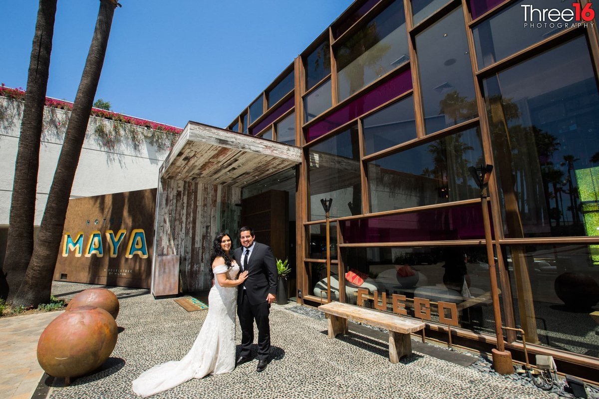Bride and Groom outside the Hotel Maya wedding venue