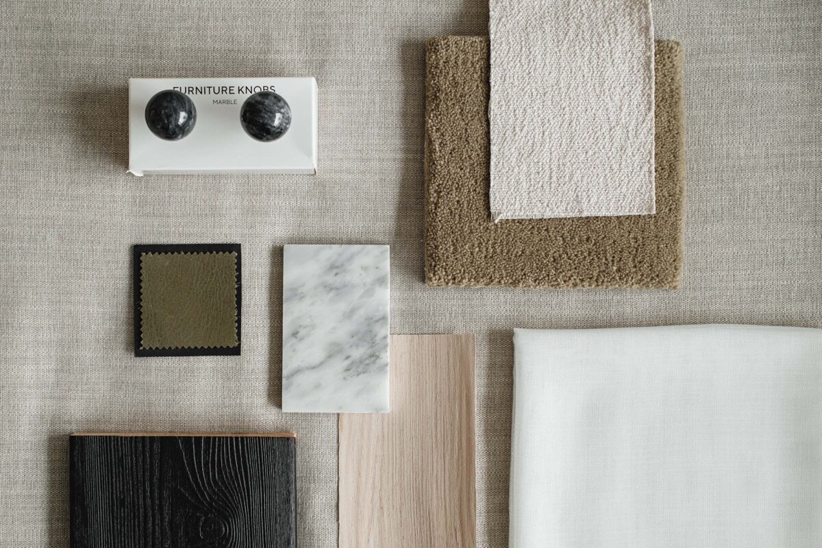 kaboompics_interior-design-material-board-home-styling-a-neutral-color-scheme-fabric-samples-35121