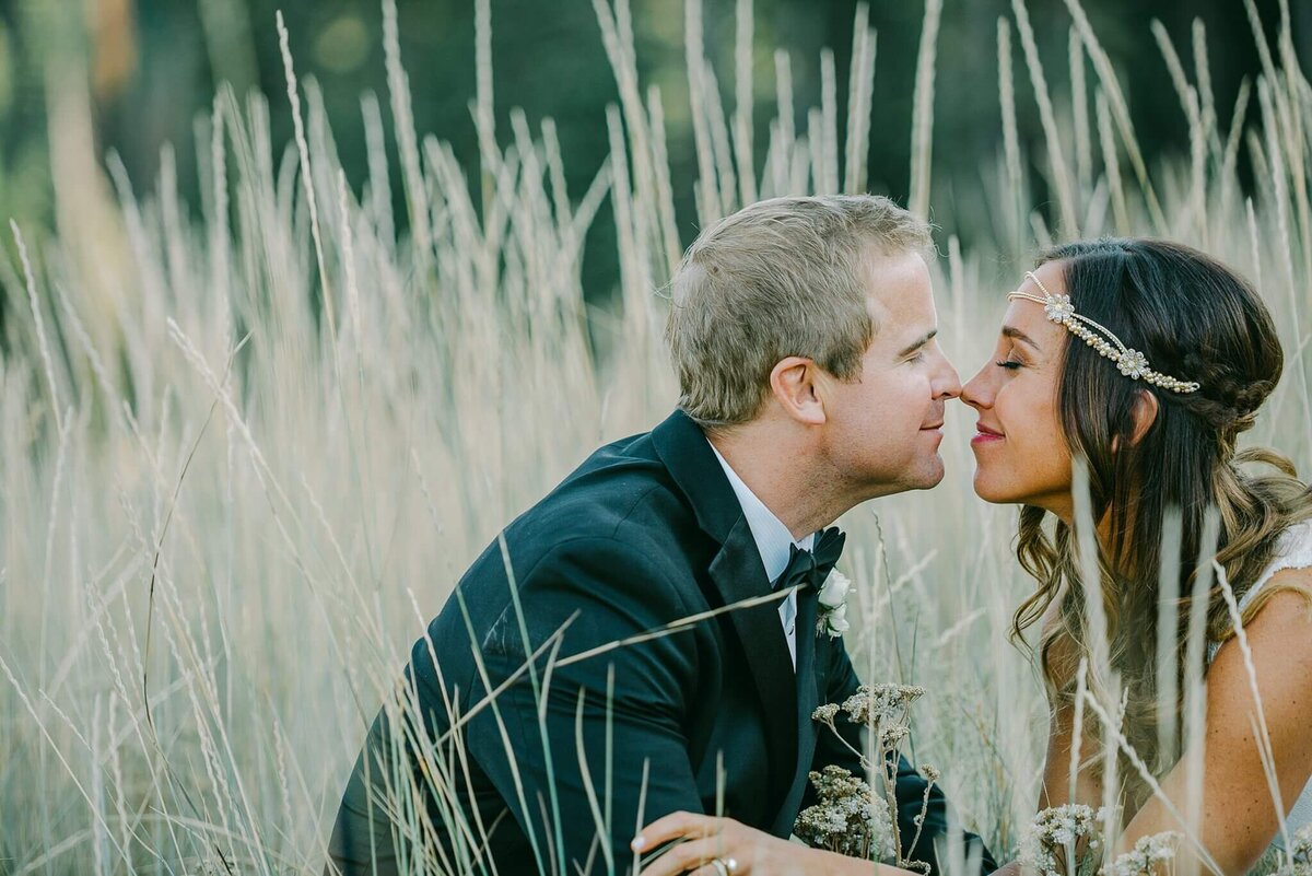 Couple touching noses during portraits at Ritz tahoe