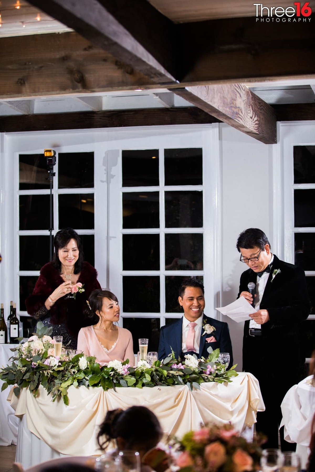 Best Man toasts the newly married couple at the wedding reception