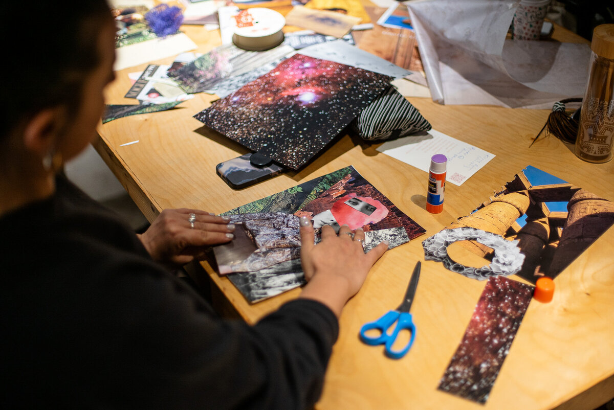A person is arranging their images for their collage