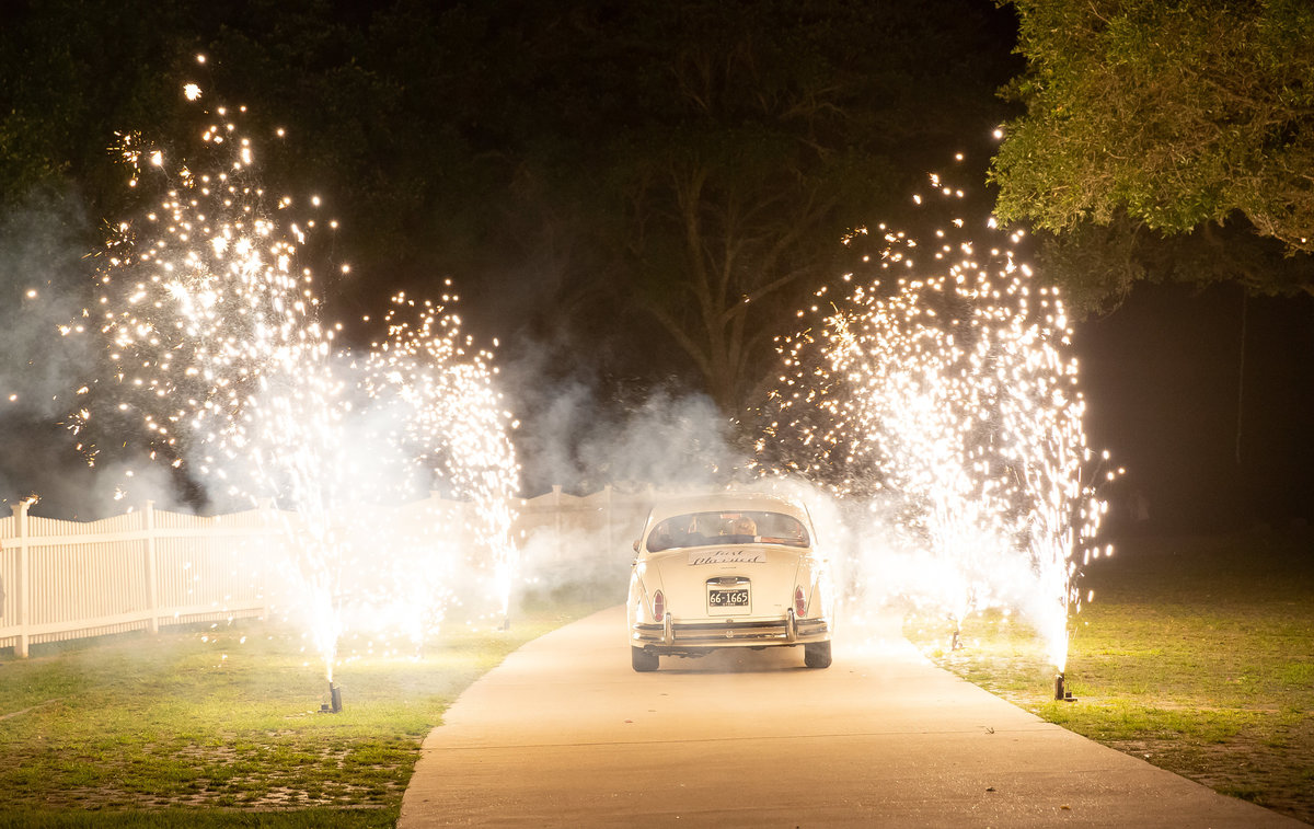 Glamorous exit with antique car in Gulfport MS at Grass Lawn