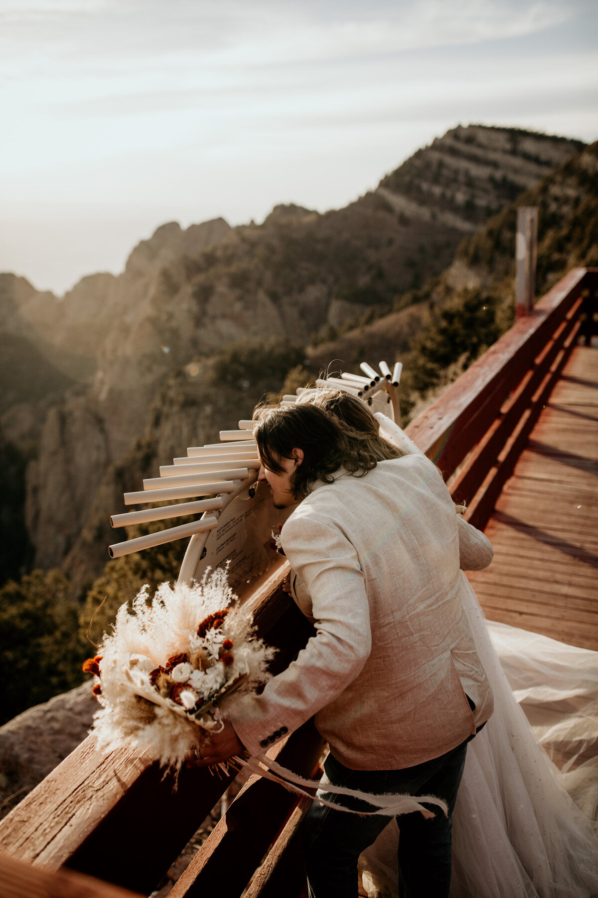 bride and groom at the top of sandia peak tramway