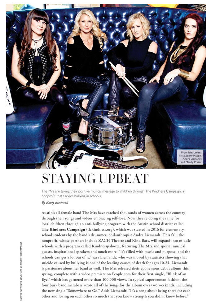 Magazine Article Publication Elmore featuring female band The Mrs sittings in blue leather booth