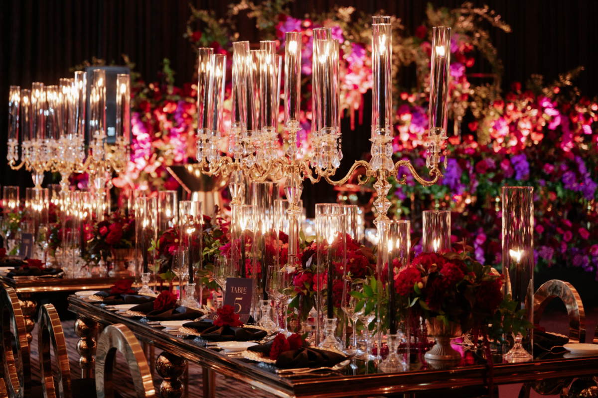 black-gold-pink-burgundy-wedding-reception-crystal-candelabras-flowers