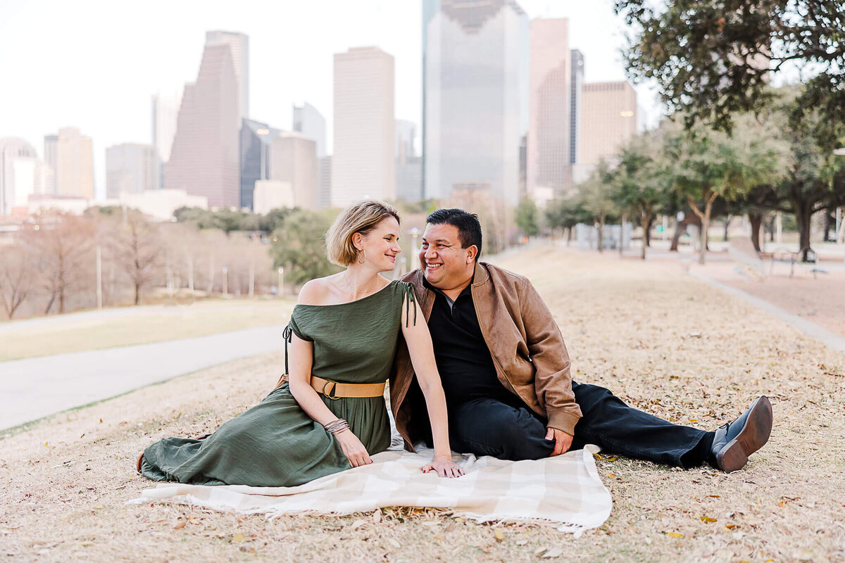 Couple with Houston skyline behind them