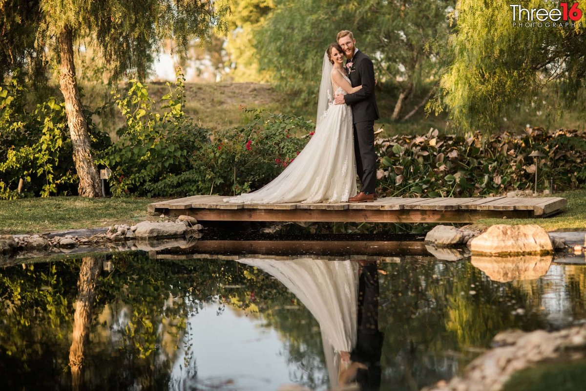 Bride and Groom by the lake