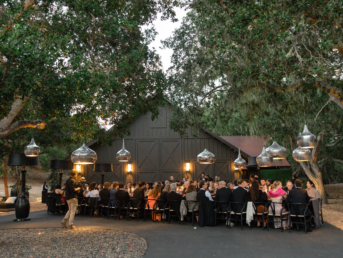 Guests enjoying dinner at a wedding at the preserve