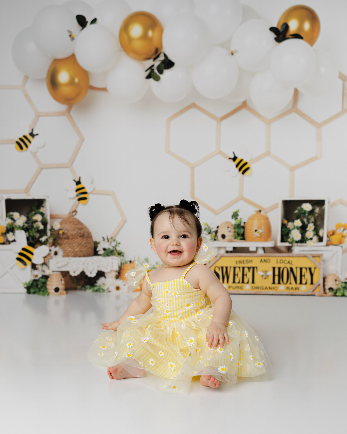 ressed in yellow and ready to shine, this sweet birthday girl brought all the joy to her bee-themed cake smash. Captured by Yucaipa cake smash photographer Kaitlyn Dawn Photography.