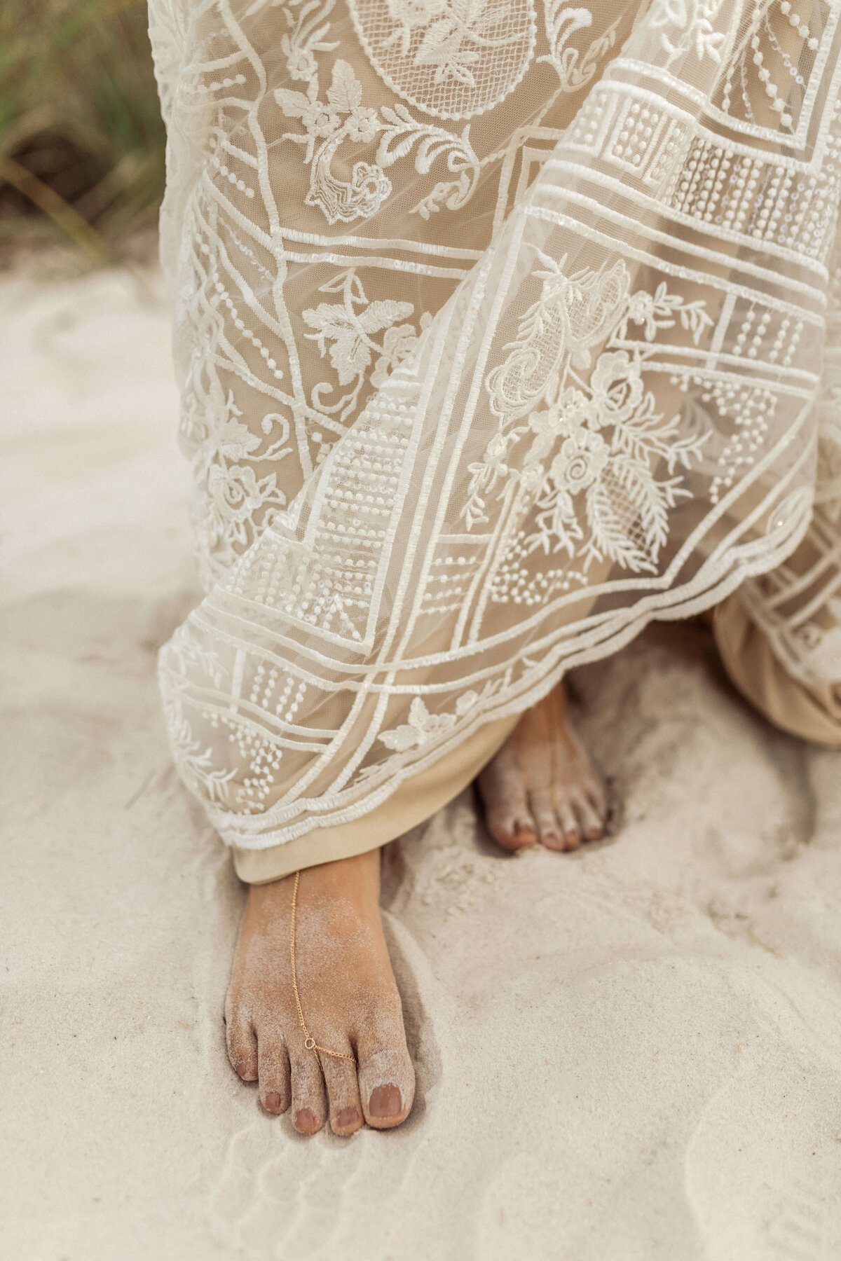 portrait of bridal feet on beach in panama city beach florida + her barefoot sandles