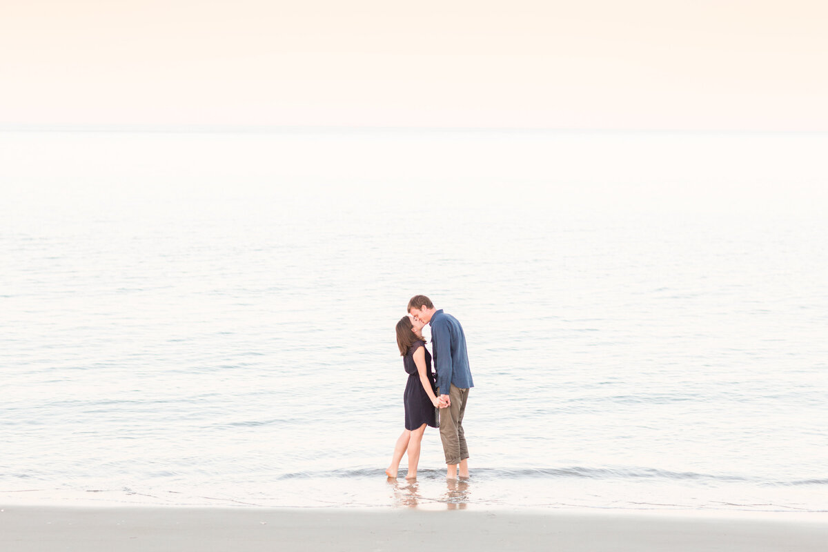 Couple kissing in the ocean