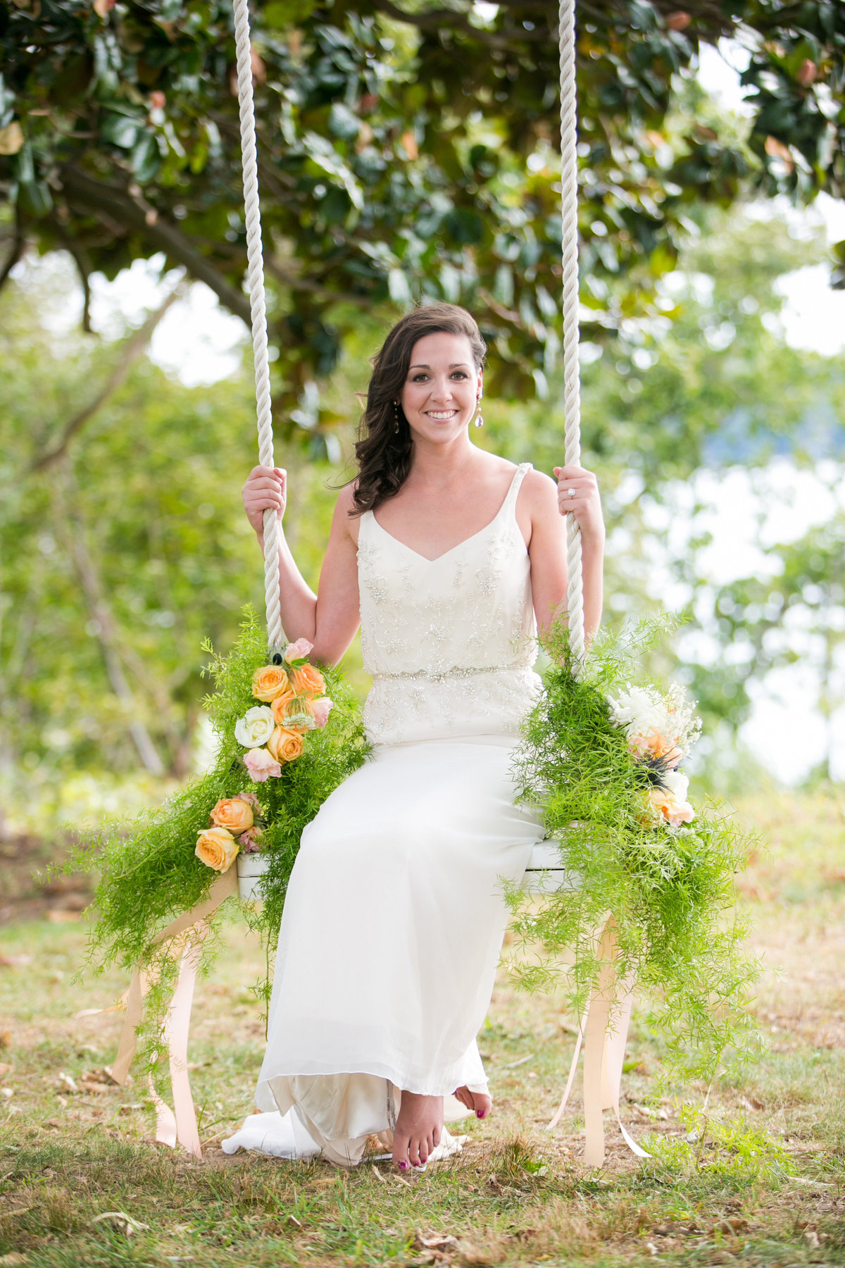 Bohemia Overlook wedding bride on a swing