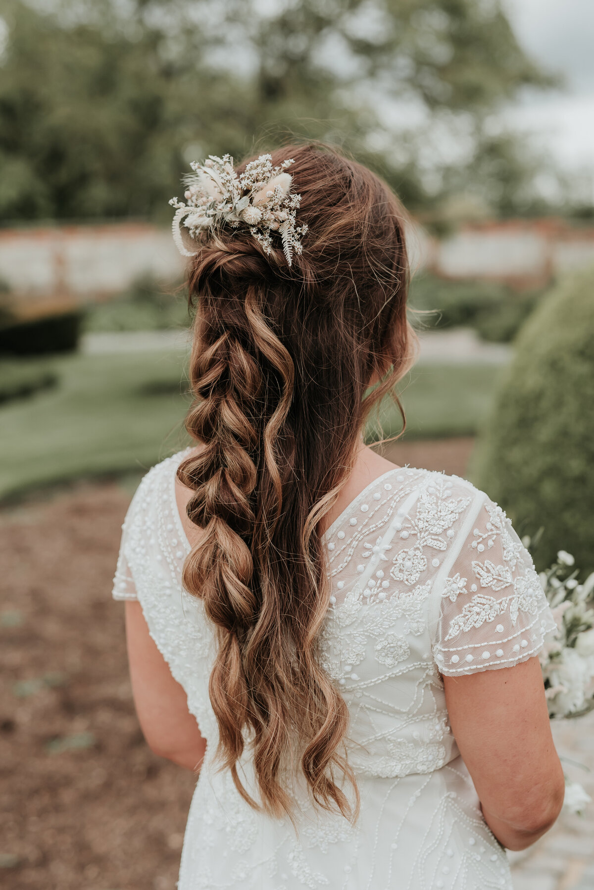 Close up of beautiful boho plaited bridal hair