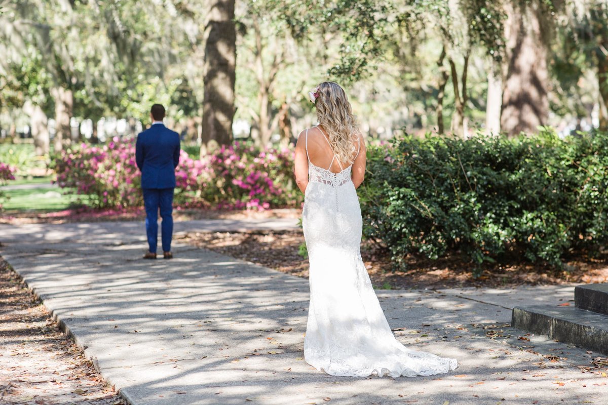 first look between bride and groom in forsyth park