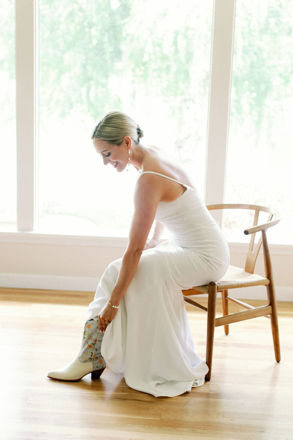 Bride Putting on Shoes