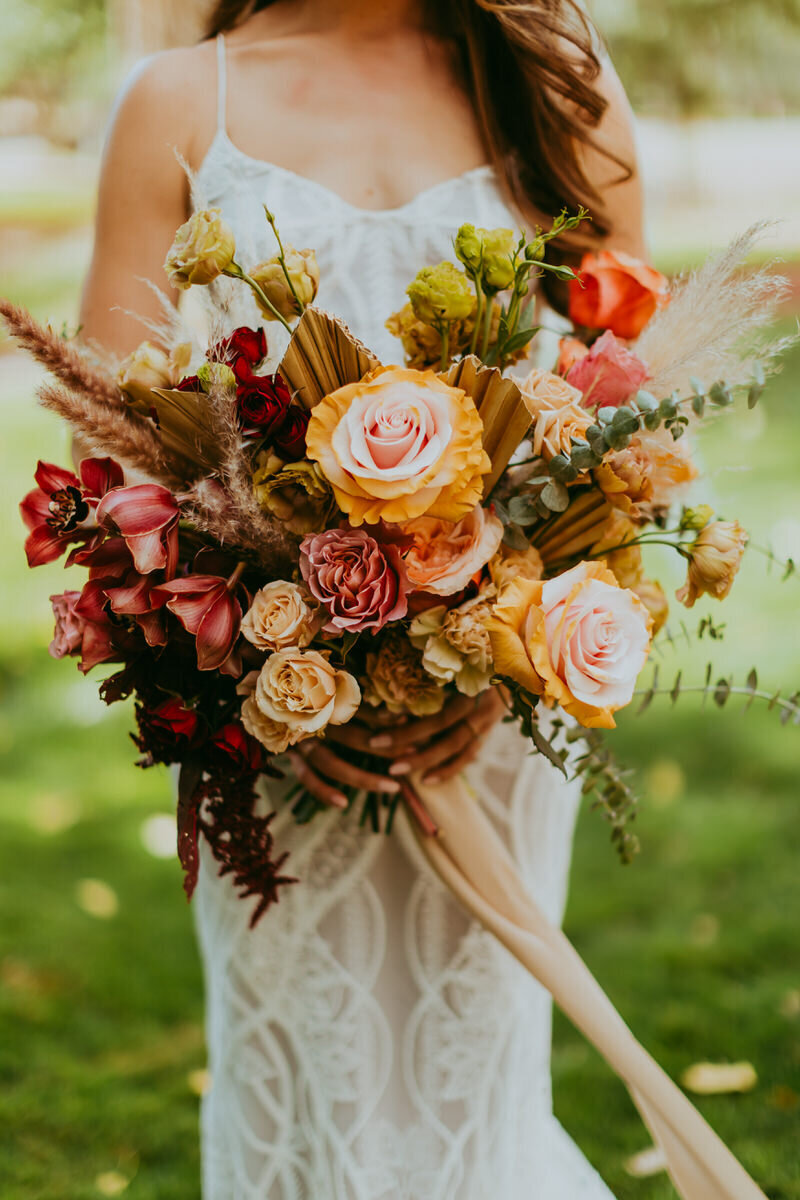 bride holds wedding bouquet