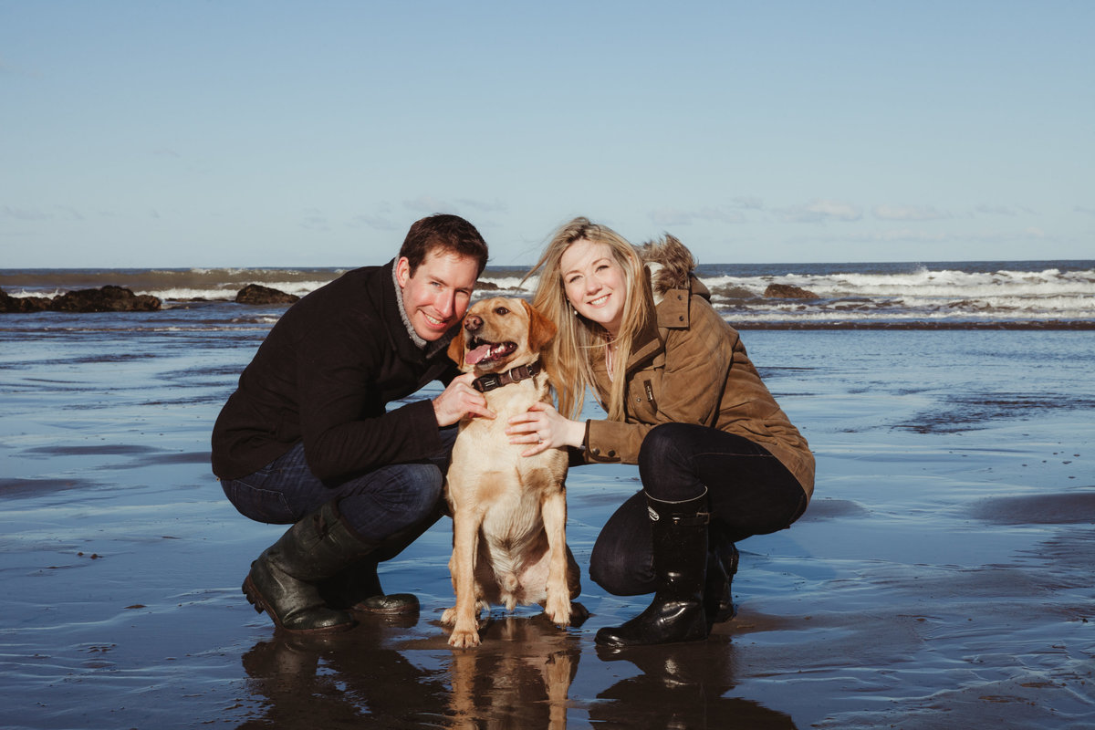 pre wedding dog engagement shoot at beach in water