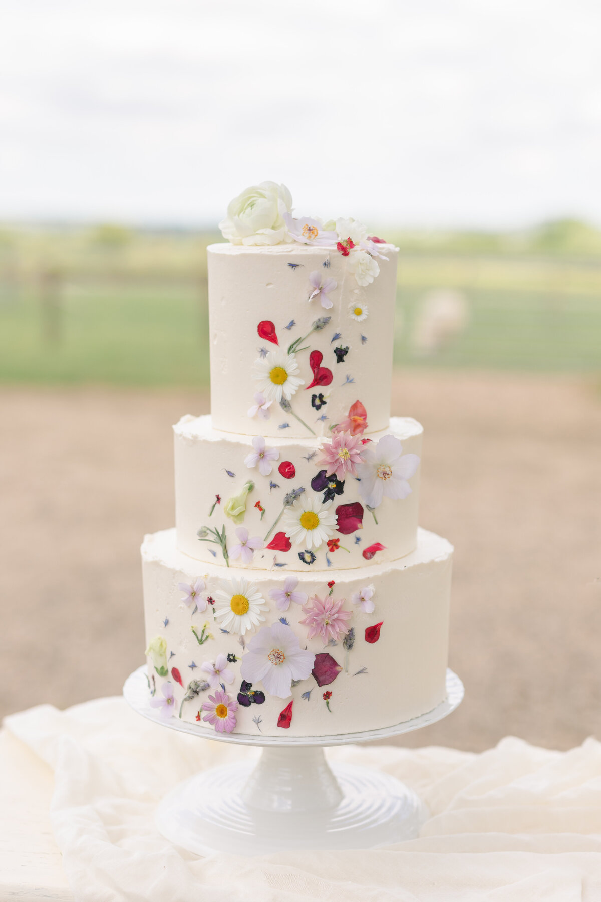 Edible flower cake for outdoor garden wedding