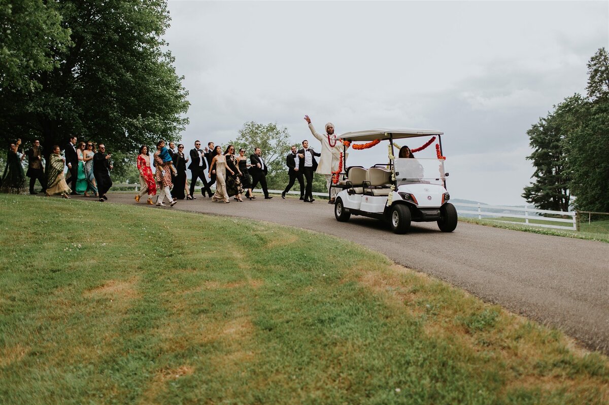 Barat with a golf cart at Ankony Carriage House with Hudson Valley Wedding Planner Canvas Weddings
