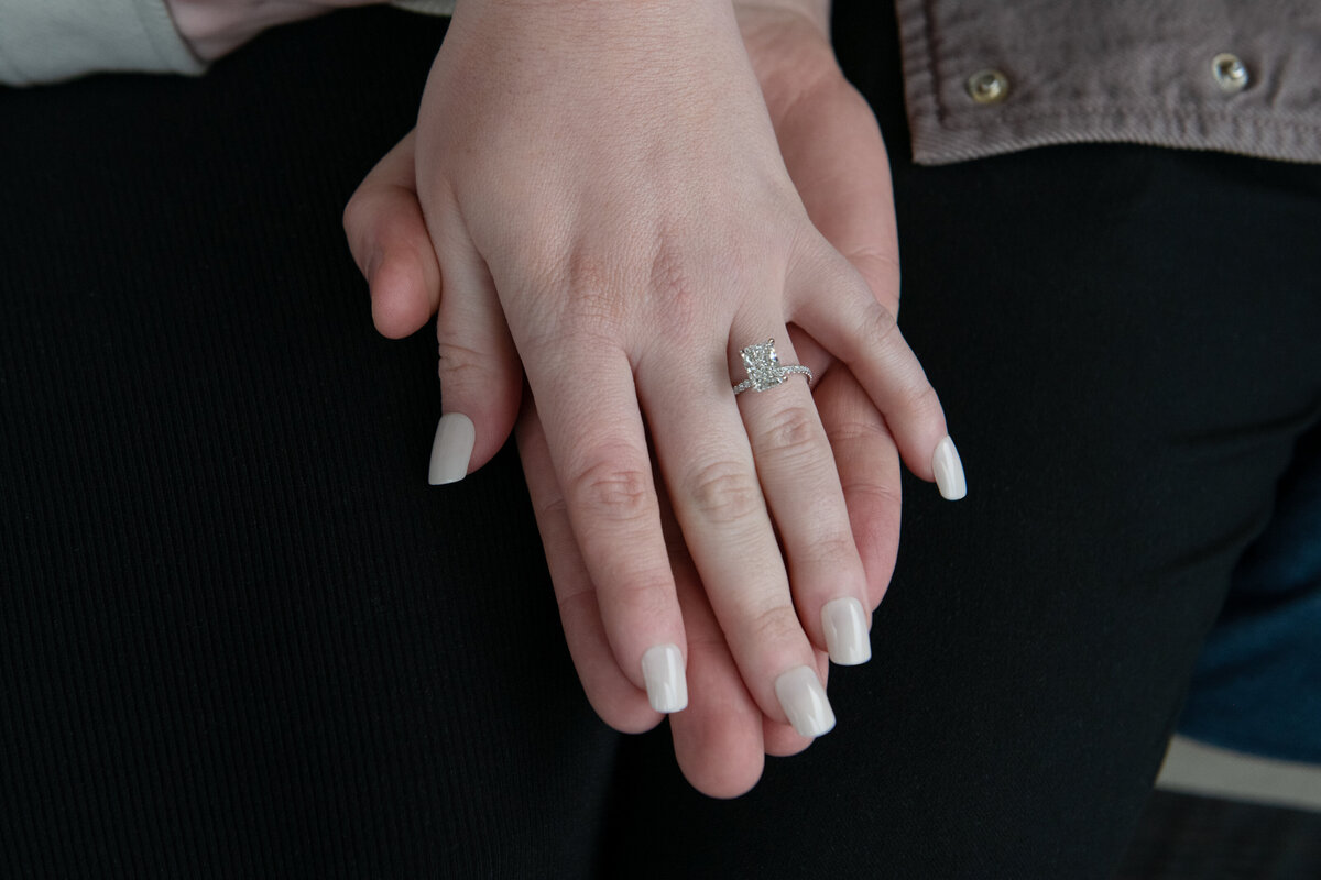 Hands of newly engaged couple in ogunquit maine