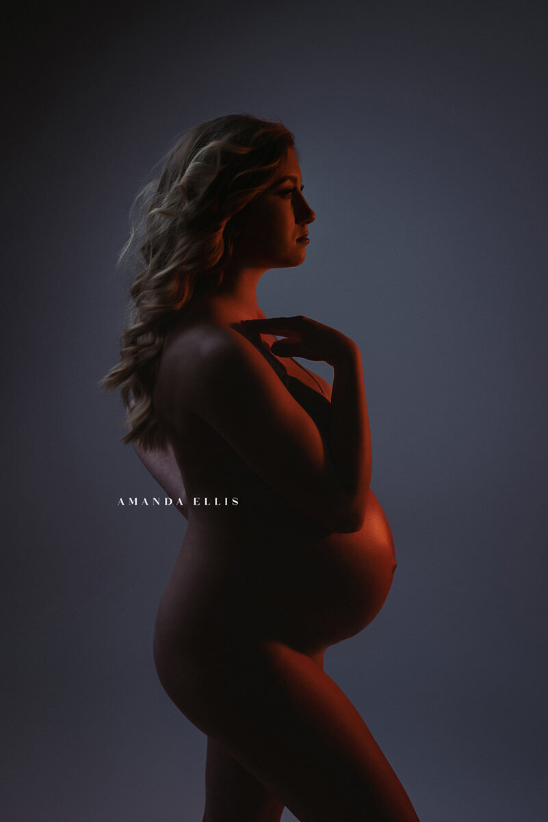 Artistic maternity portrait of woman