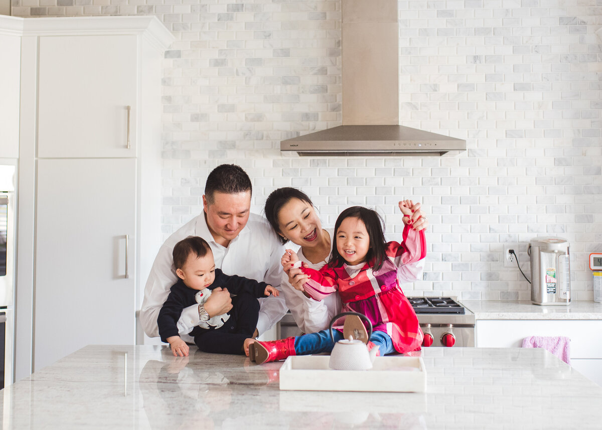 Des-Moines-Iowa-Family-Photographer-Theresa-Schumacher-Photography-Asian-Family-Kitchen-playing-laughing