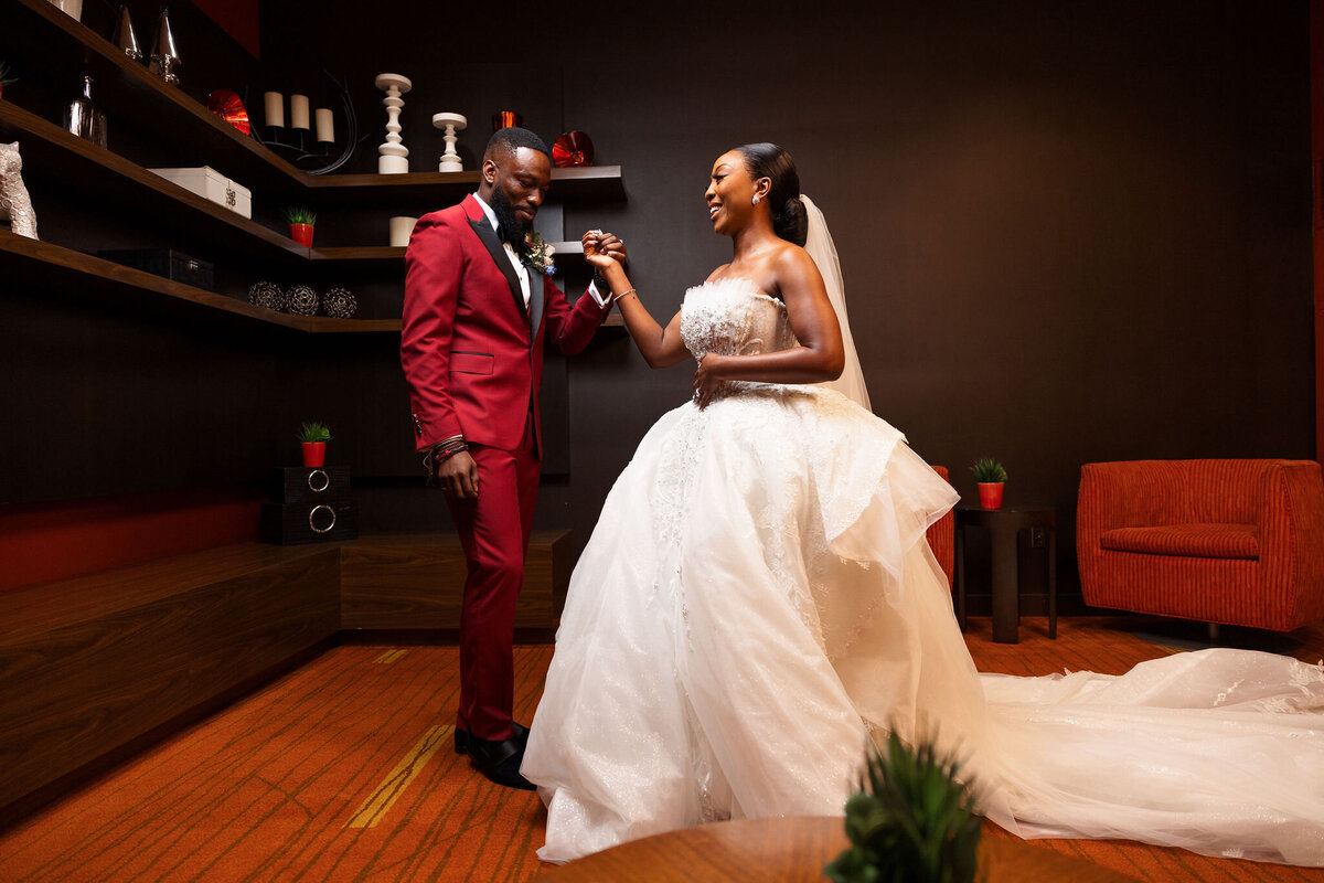 Tomi and Tolu Oruka Events Ziggy on the Lens photographer Wedding event planners Toronto planner African Nigerian Eyitayo Dada Dara Ayoola ottawa convention and event centre pocket flowers Navy blue groom suit ball gown black bride classy  21