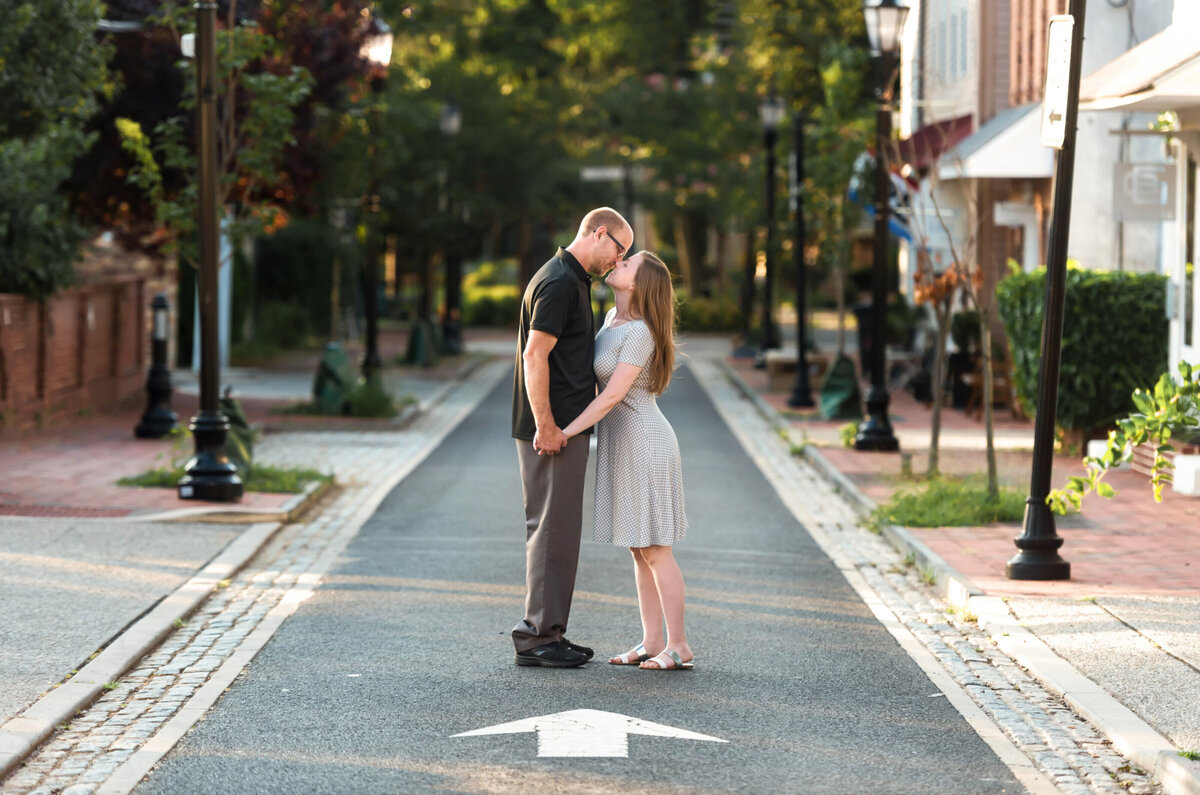 Man and woman standing in the middle of the street, kissing, and Haddonfield, New Jersey