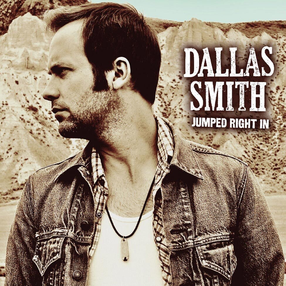 Album Cover Artist Dallas Smith closeup looking to side in front of desert mountains desaturated sepia toned Title Jumped Right In
