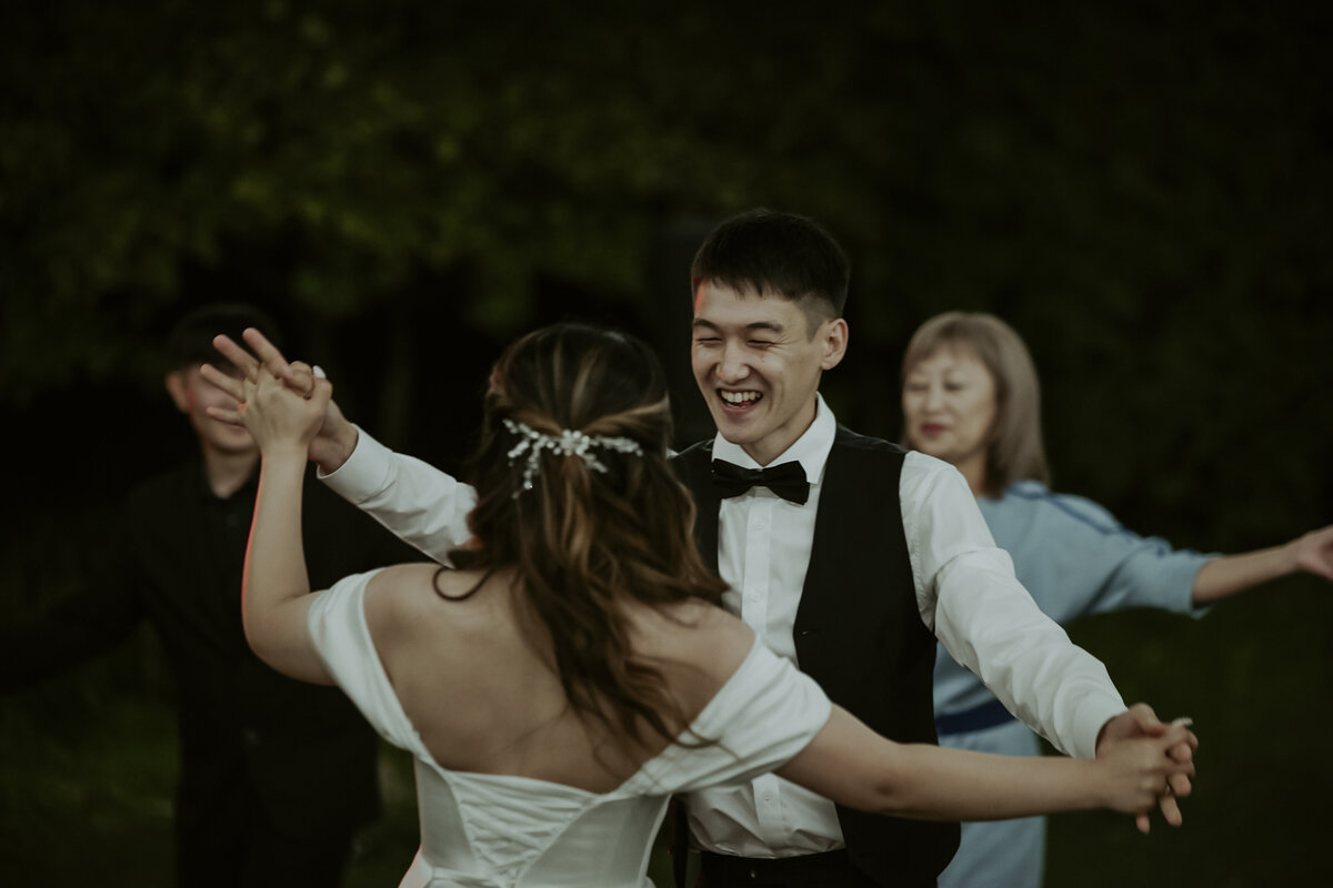 the couple having their dance and smiling